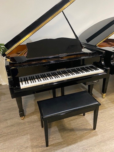 Samick player baby grand piano