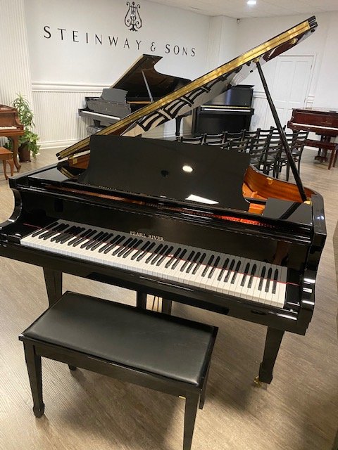 Pearl River 4’11 baby grand in polished ebony 